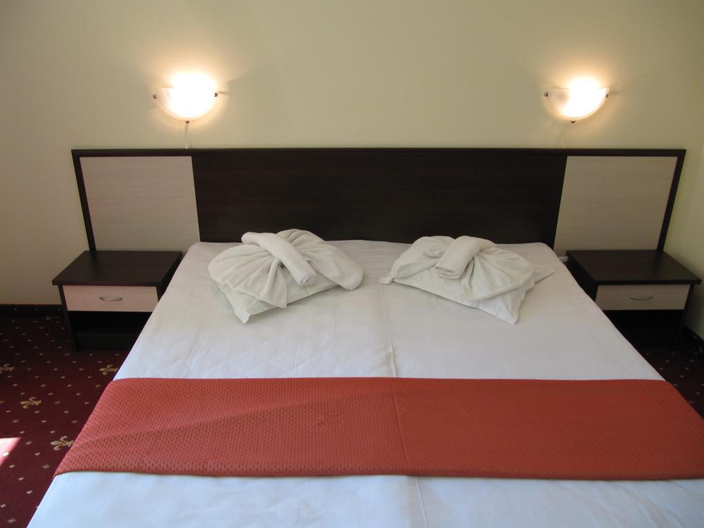 Maverick Hotel Napospart Szoba fotó